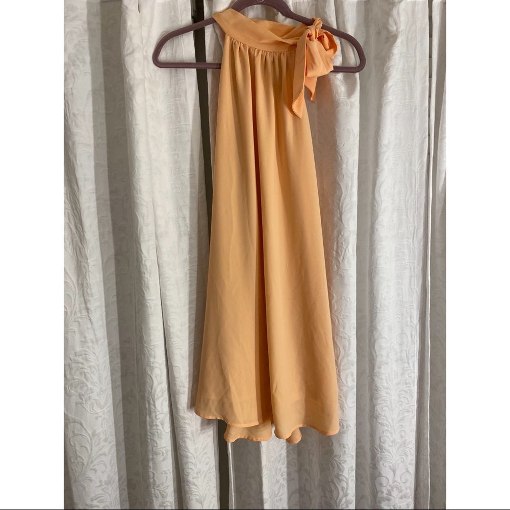 TCEC Women’s Boutique light peach/orange dress